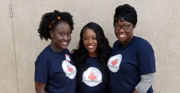 nurse 2 nurse volunteers showing of merch