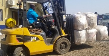 tow motor putting in work with Nurse 2 Nurse donations